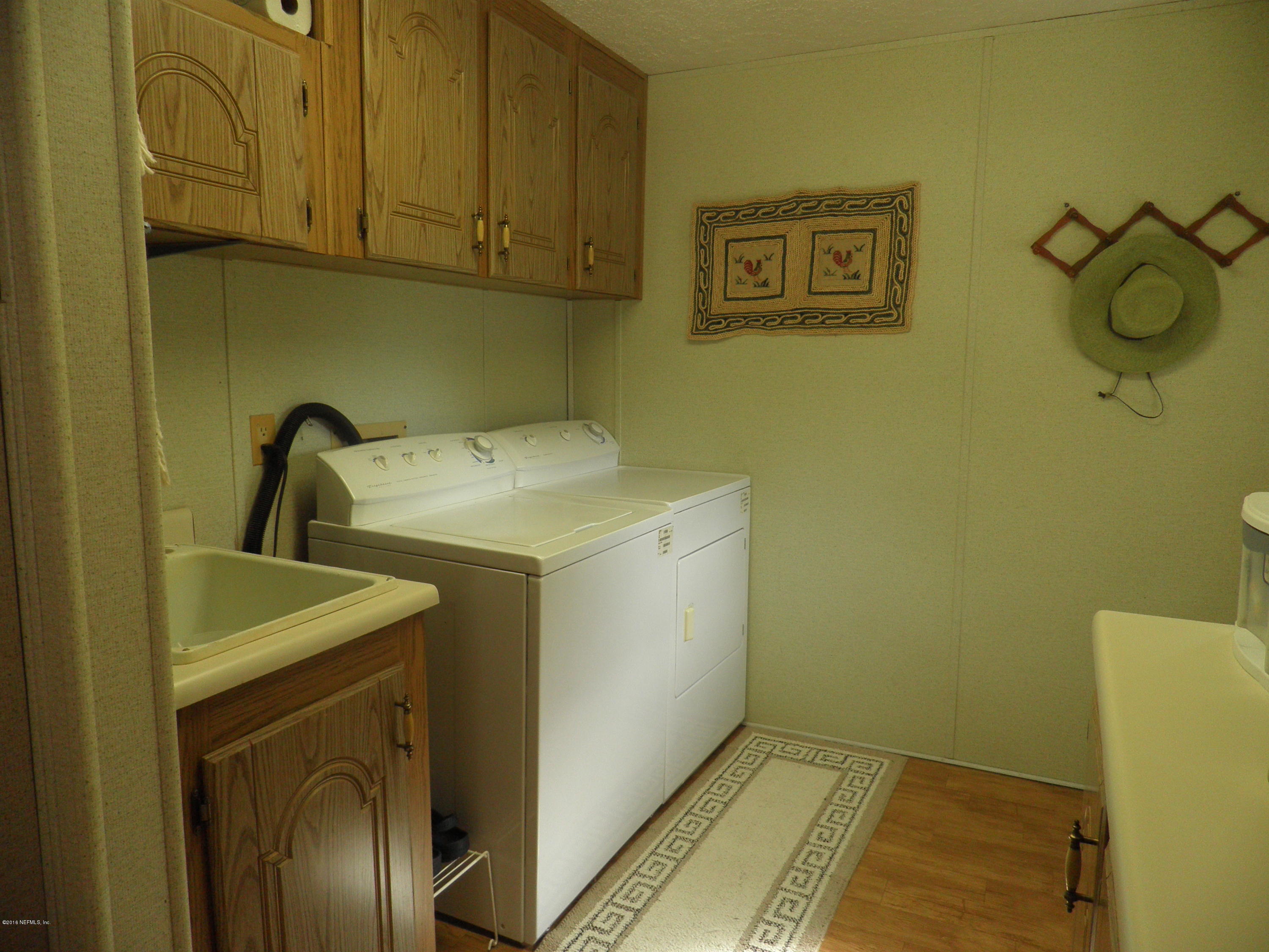 268 Beulah Church Road Welaka, FL 32112 - Photo 2 of 33 a utility room with a sink