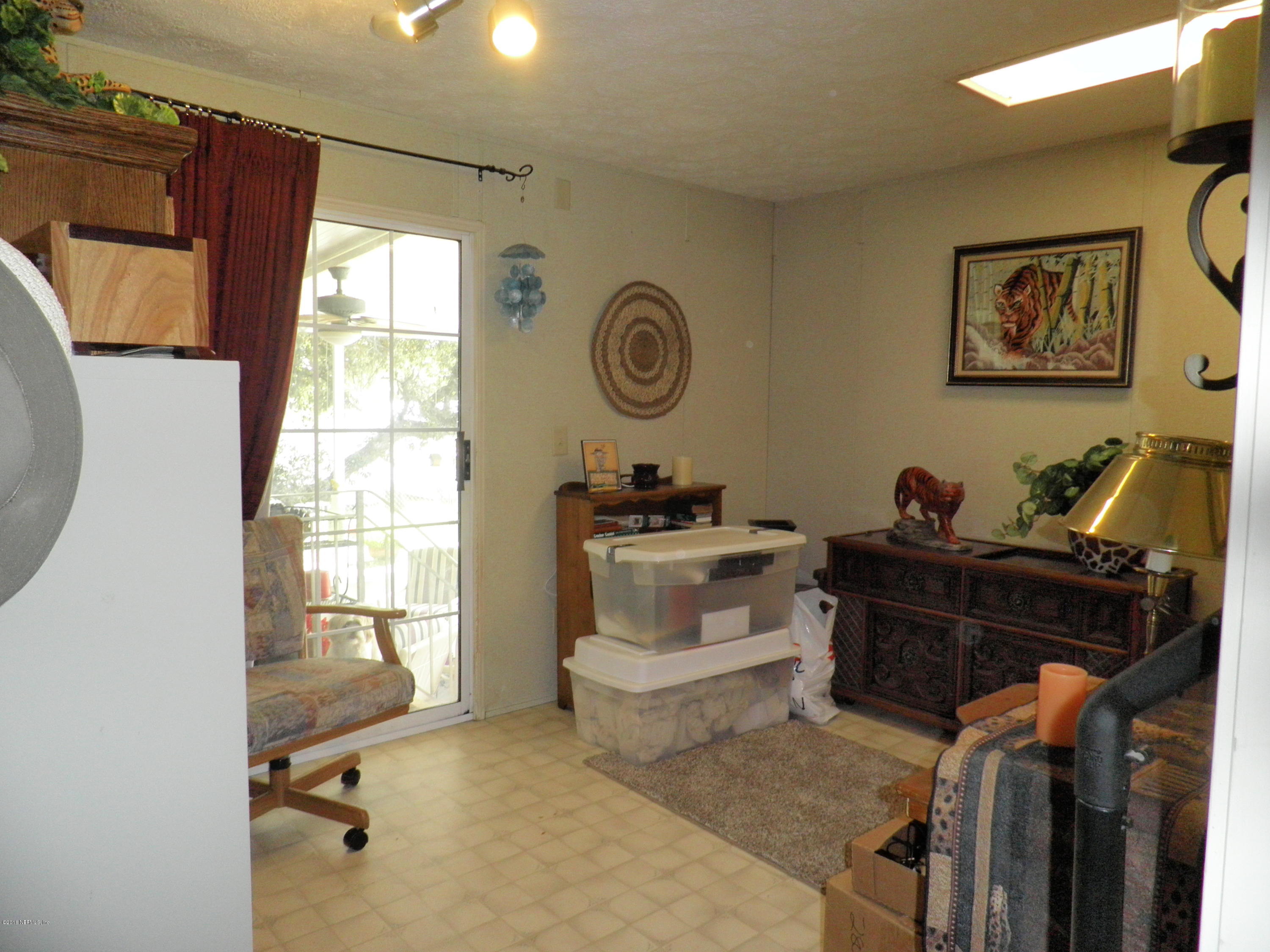 268 Beulah Church Road Welaka, FL 32112 - Photo 21 of 33 a view of workspace with furniture and window