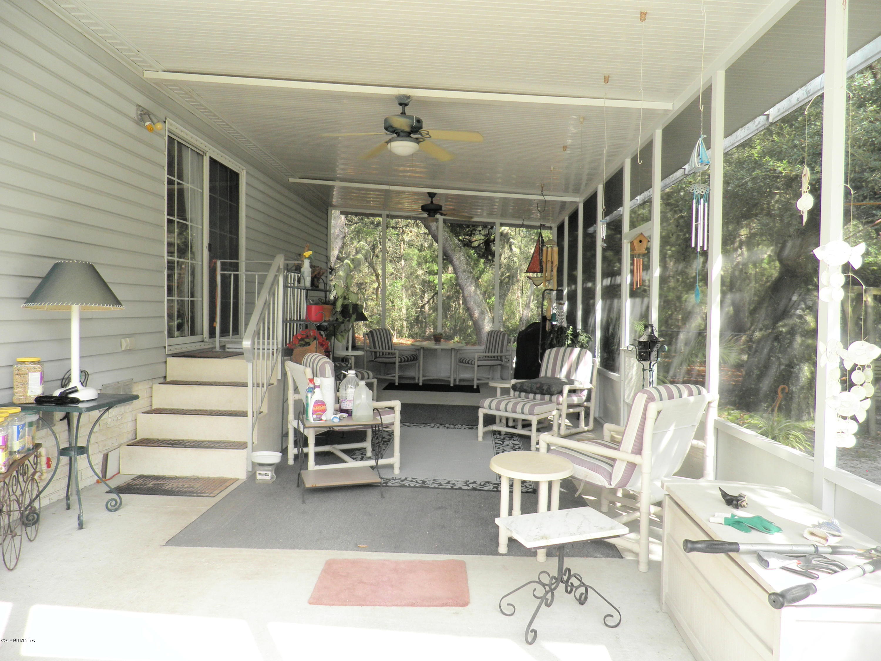 268 Beulah Church Road Welaka, FL 32112 - Photo 28 of 33 a living room with furniture