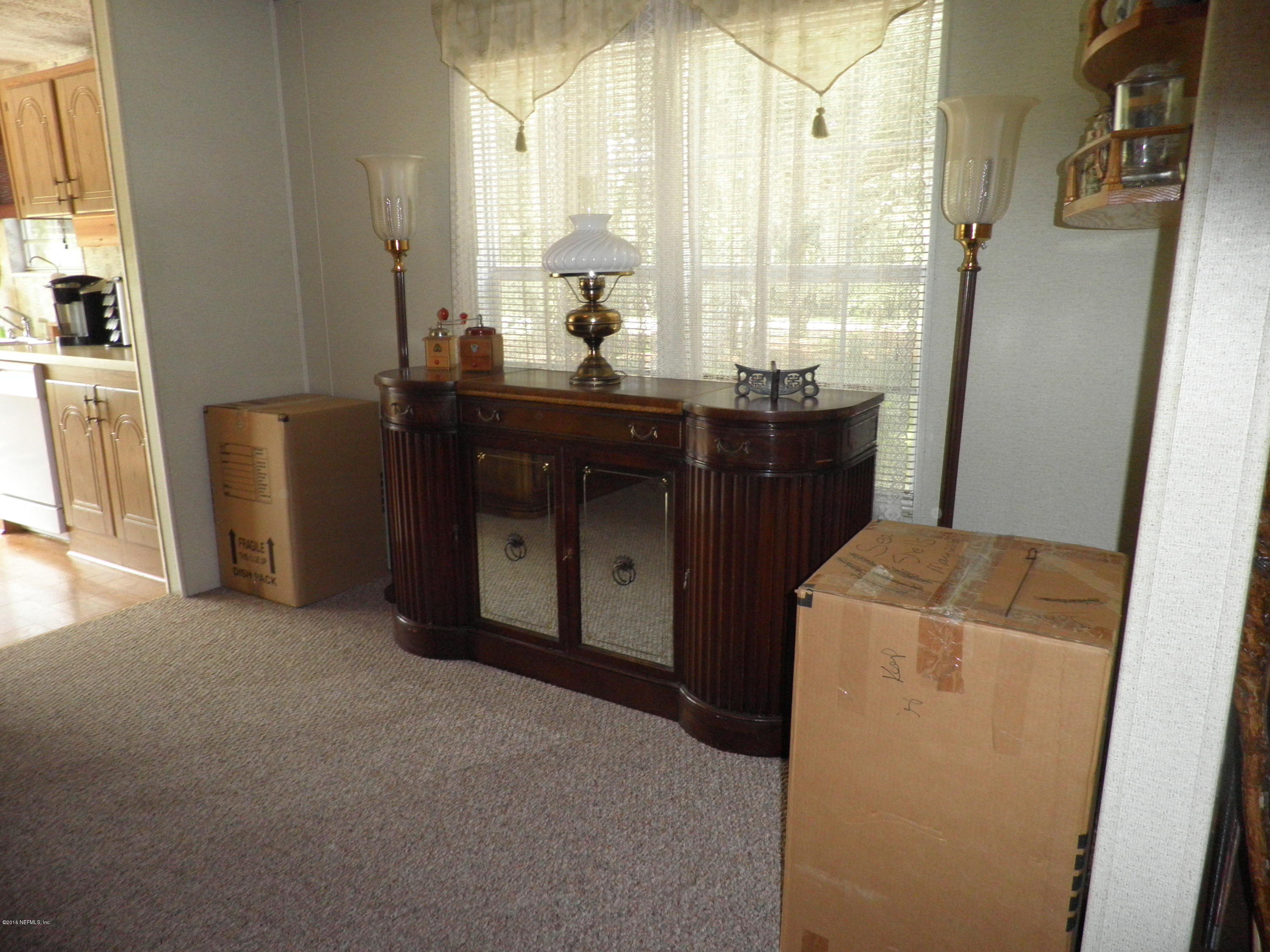 268 Beulah Church Road Welaka, FL 32112 - Photo 7 of 33 a room with a sink and a mirror