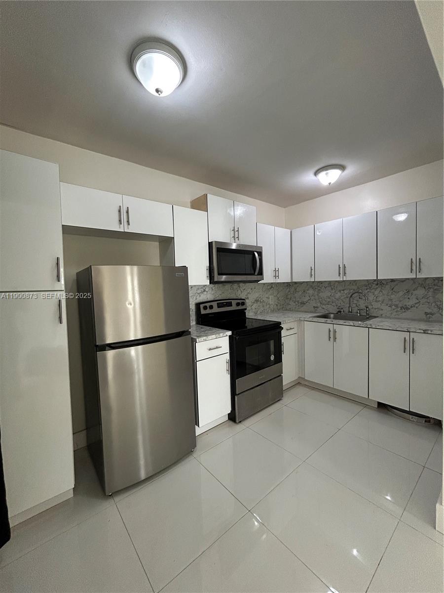 1945 Northeast 171 Street, Unit 3 North Miami Beach, FL 33162 - Photo 2 of 10