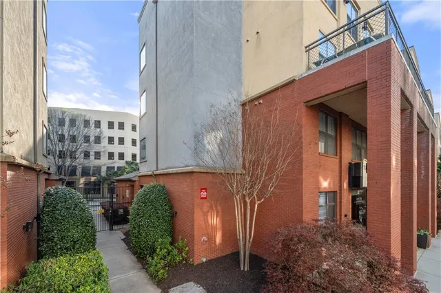 a view of front door with wooden floor
