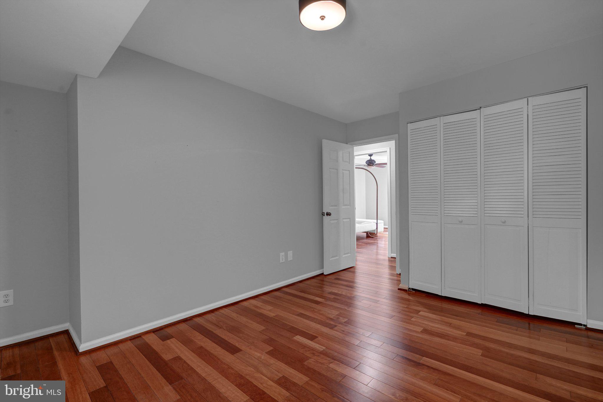 2382 Generation Drive Reston, VA 20191 - Photo 22 of 49 Spacious room with warm wood floors.