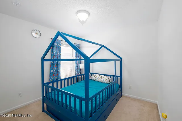 a view of a hallway with a large window