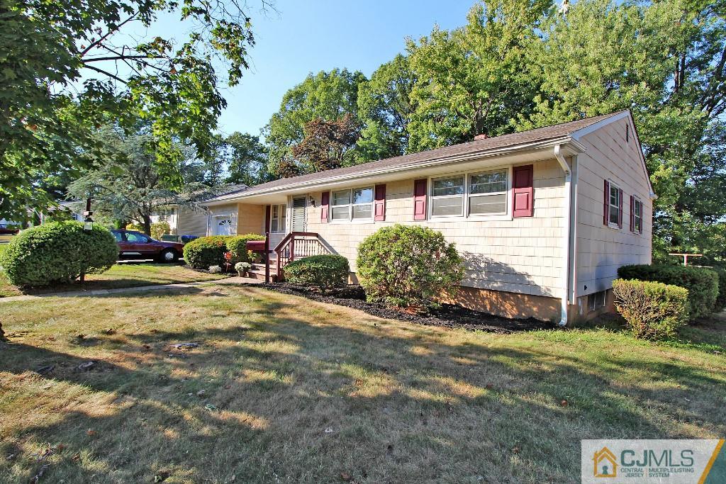 9 Gales Road Edison, NJ 08837 - Photo 2 of 25 a view of a house with backyard and sitting area