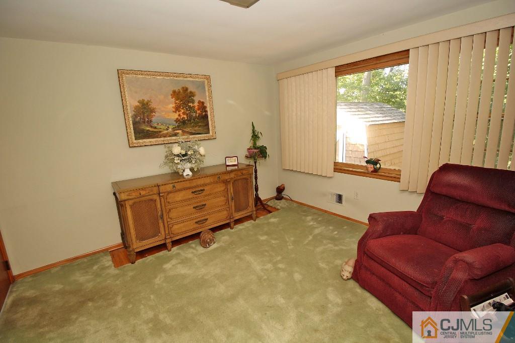 9 Gales Road Edison, NJ 08837 - Photo 13 of 25 a living room with furniture and a window