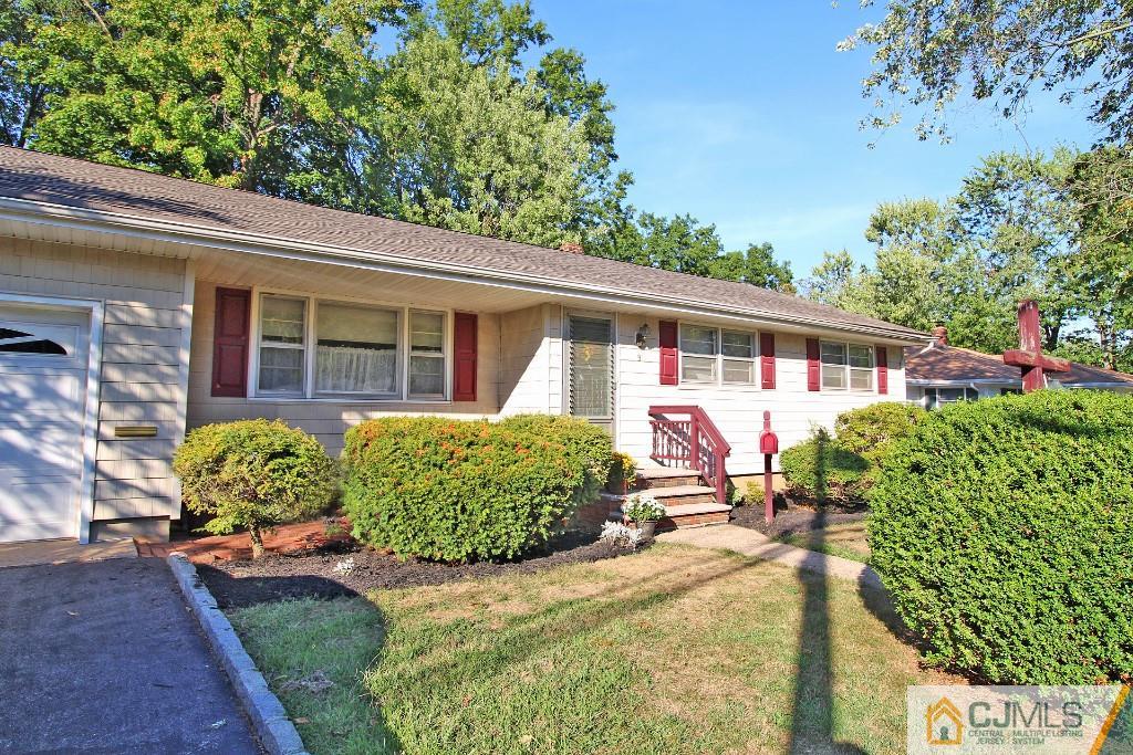 9 Gales Road Edison, NJ 08837 - Photo 3 of 25 a front view of a house with garden