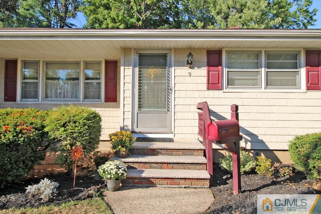 9 Gales Road Edison, NJ 08837 - Photo 4 of 25 a front view of a house with a porch