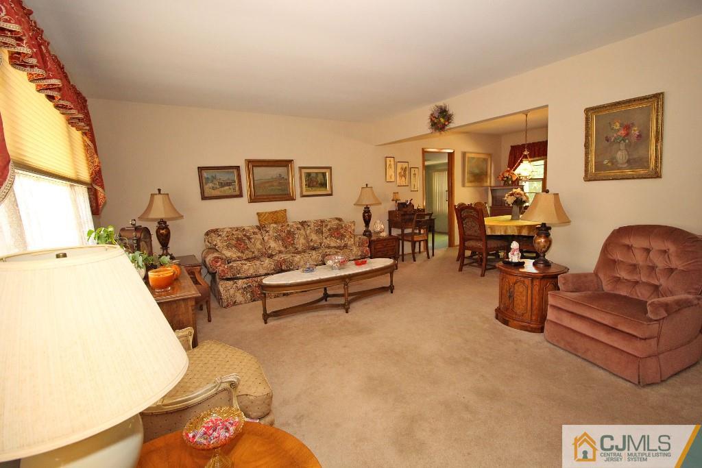 9 Gales Road Edison, NJ 08837 - Photo 6 of 25 a living room with furniture and a couch