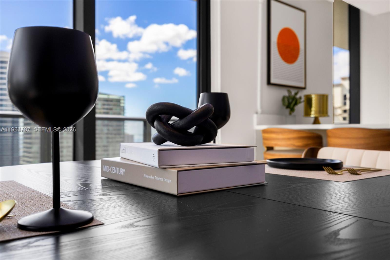 45 Southwest 9th Street, Unit 2803 Miami, FL 33130 - Photo 21 of 66 a living room with furniture and a lamp