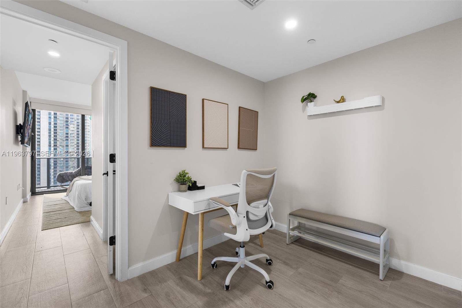 45 Southwest 9th Street, Unit 2803 Miami, FL 33130 - Photo 23 of 66 a view of a room with gym equipment