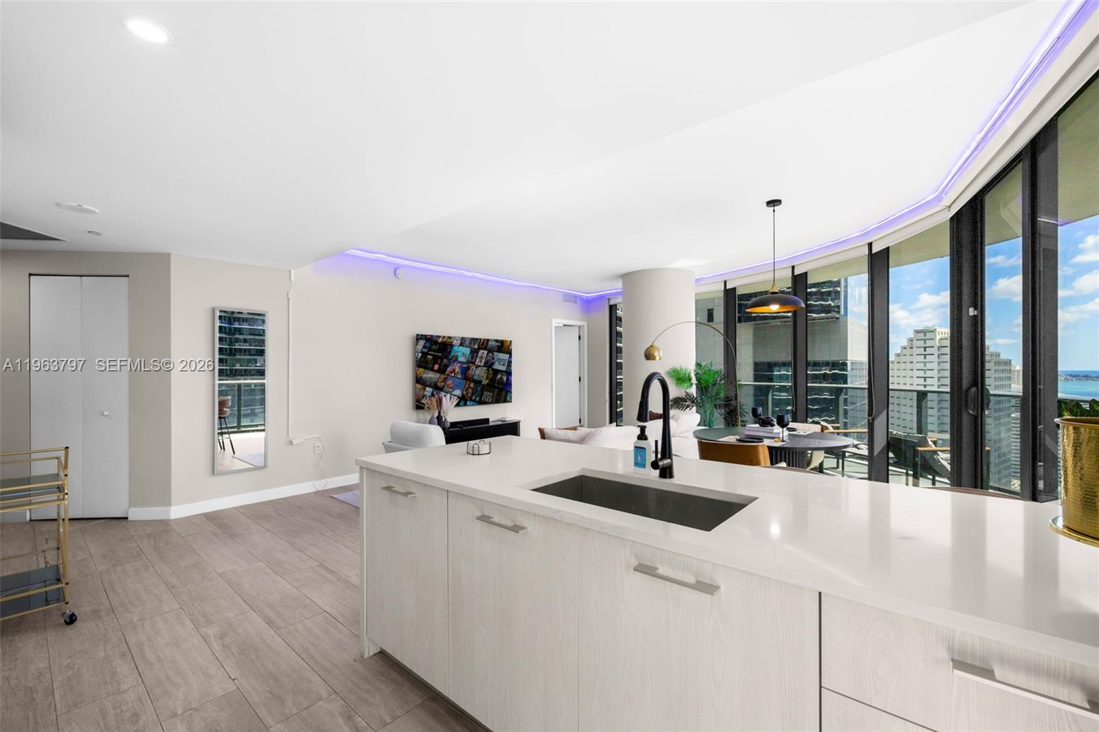 45 Southwest 9th Street, Unit 2803 Miami, FL 33130 - Photo 7 of 66 a view of living room with furniture and large window