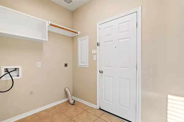 a view of a room with rack on the wall