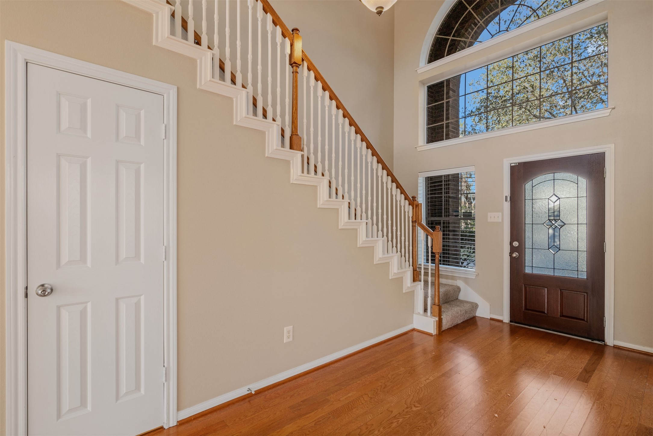 118 Bryce Branch Circle Spring, TX 77382 - Photo 4 of 25 a view of an entryway with wooden floor and door