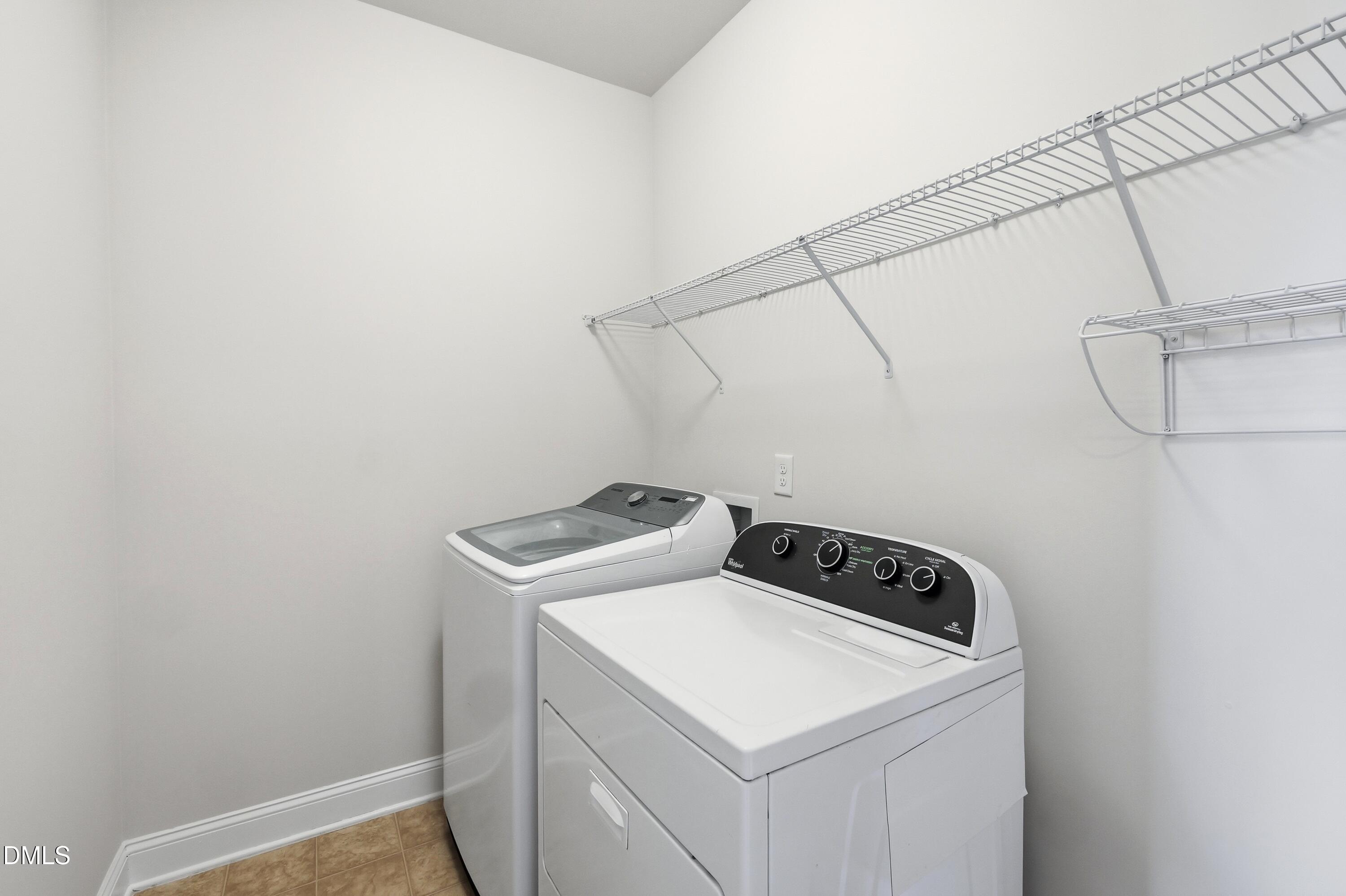1004 Waymaker Court Apex, NC 27502 - Photo 19 of 30 a utility room with dryer and washer