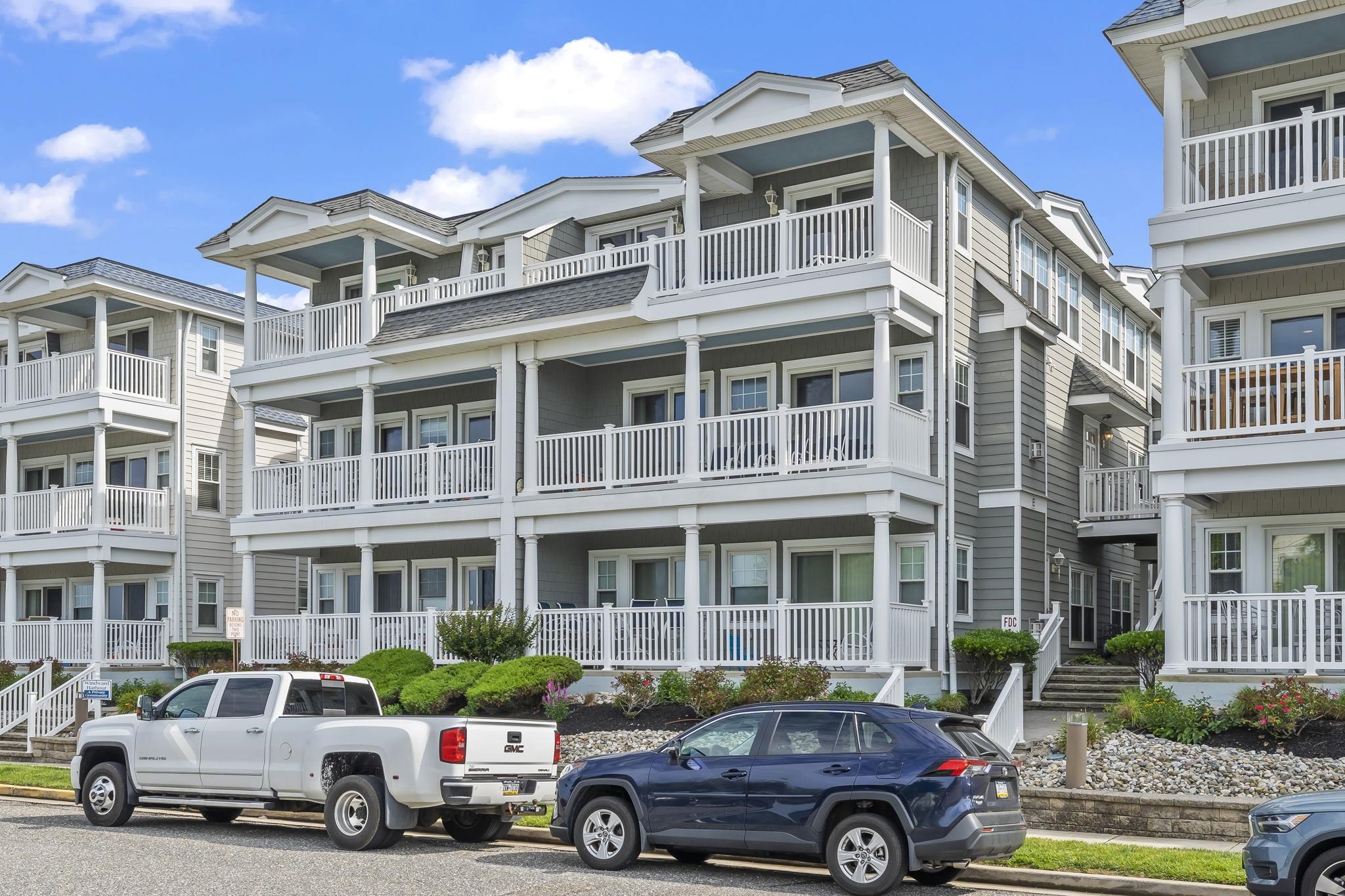 700 Ocean Drive, Unit E4 Avalon, NJ 08202 - Photo 1 of 31 a car parked in front of a building