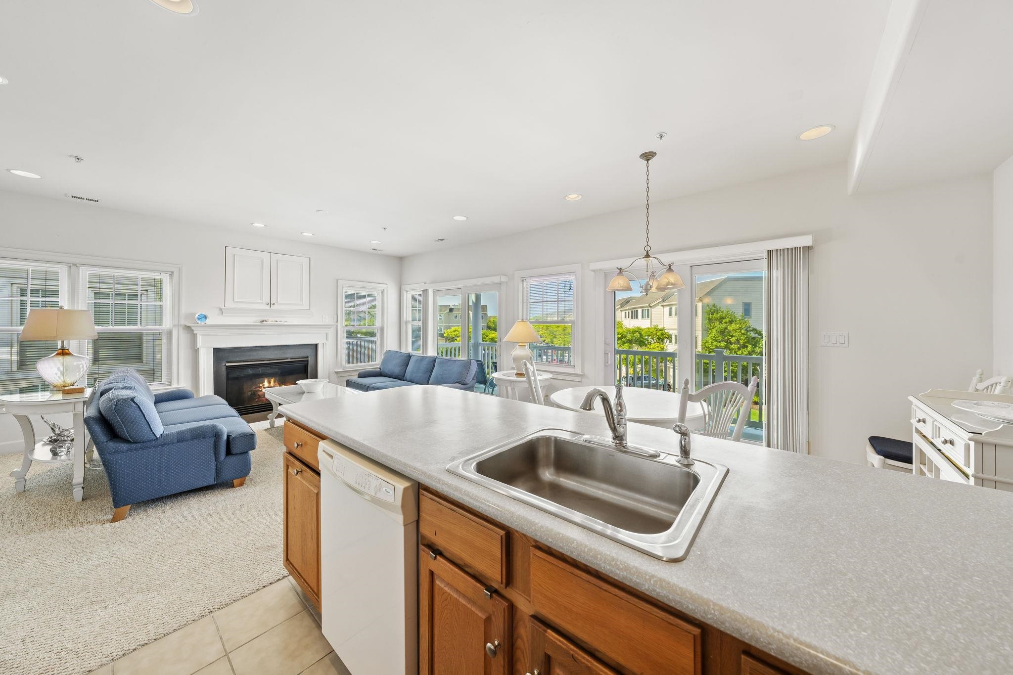700 Ocean Drive, Unit E4 Avalon, NJ 08202 - Photo 12 of 31 a kitchen with furniture a window and a sink