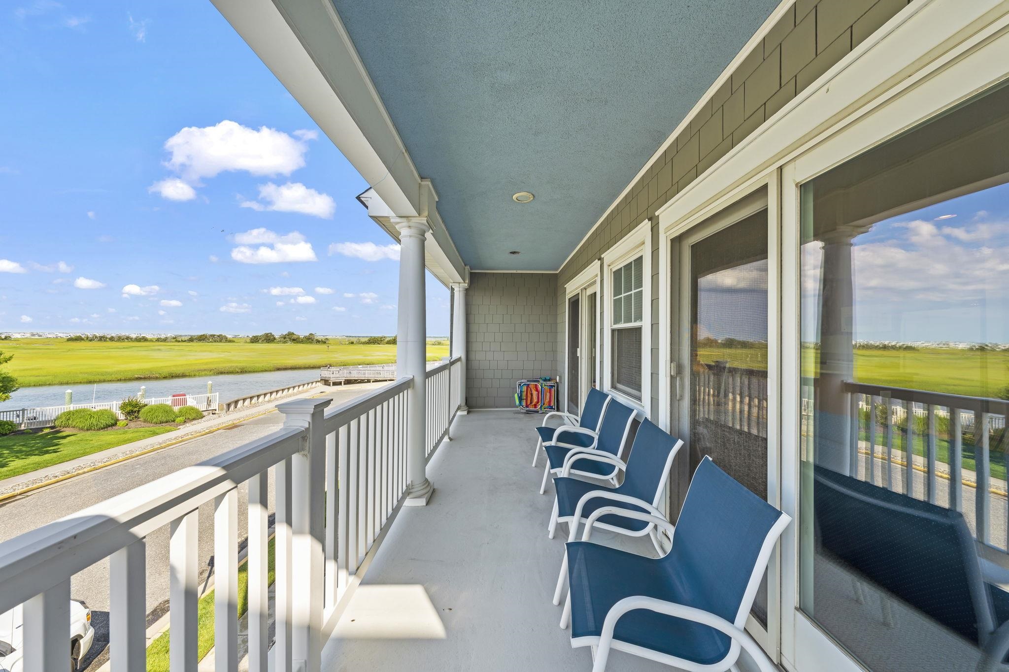 700 Ocean Drive, Unit E4 Avalon, NJ 08202 - Photo 16 of 31 a view of a city from a balcony with furniture
