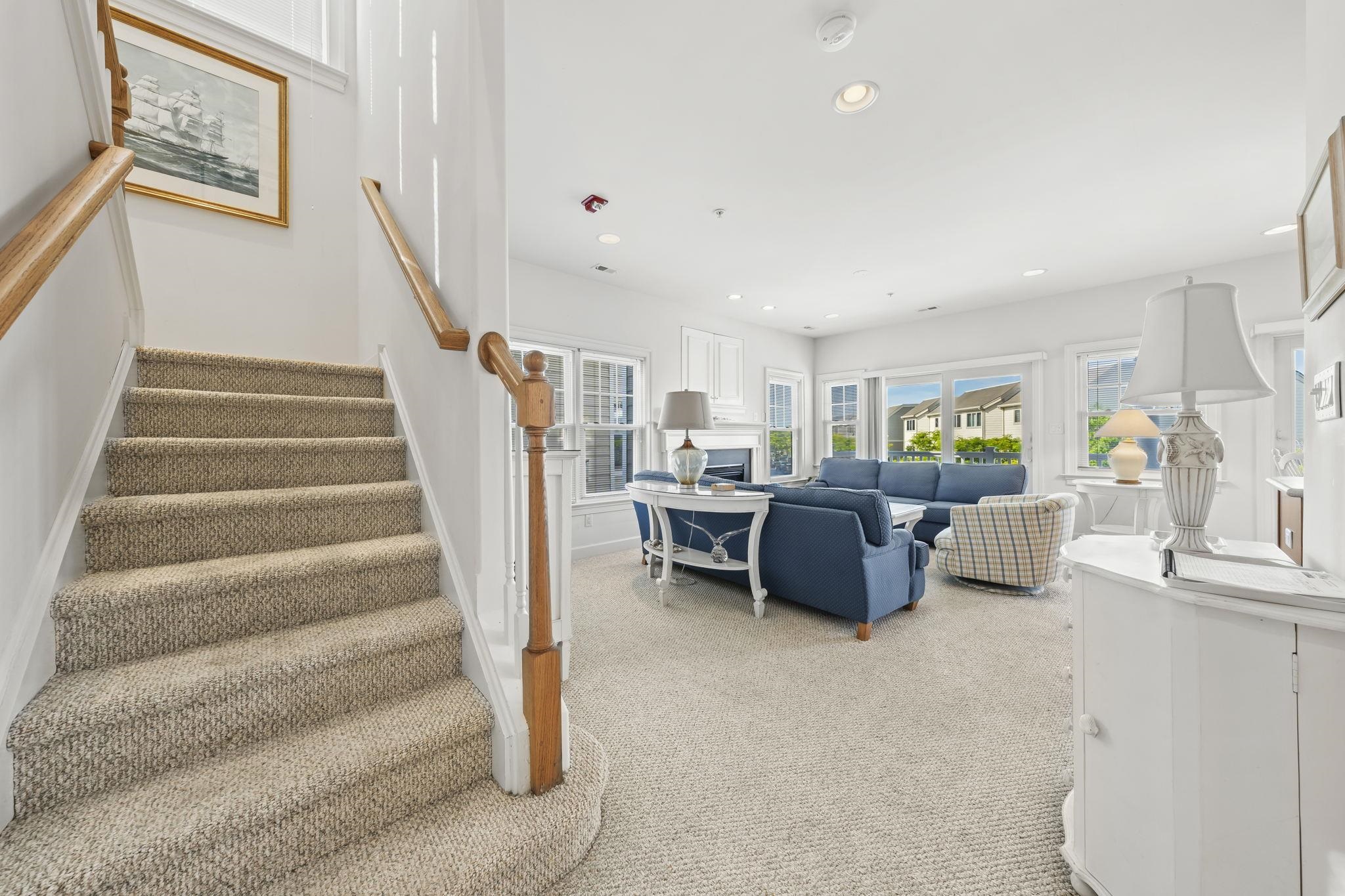 700 Ocean Drive, Unit E4 Avalon, NJ 08202 - Photo 18 of 31 a living room with furniture and a wooden floor