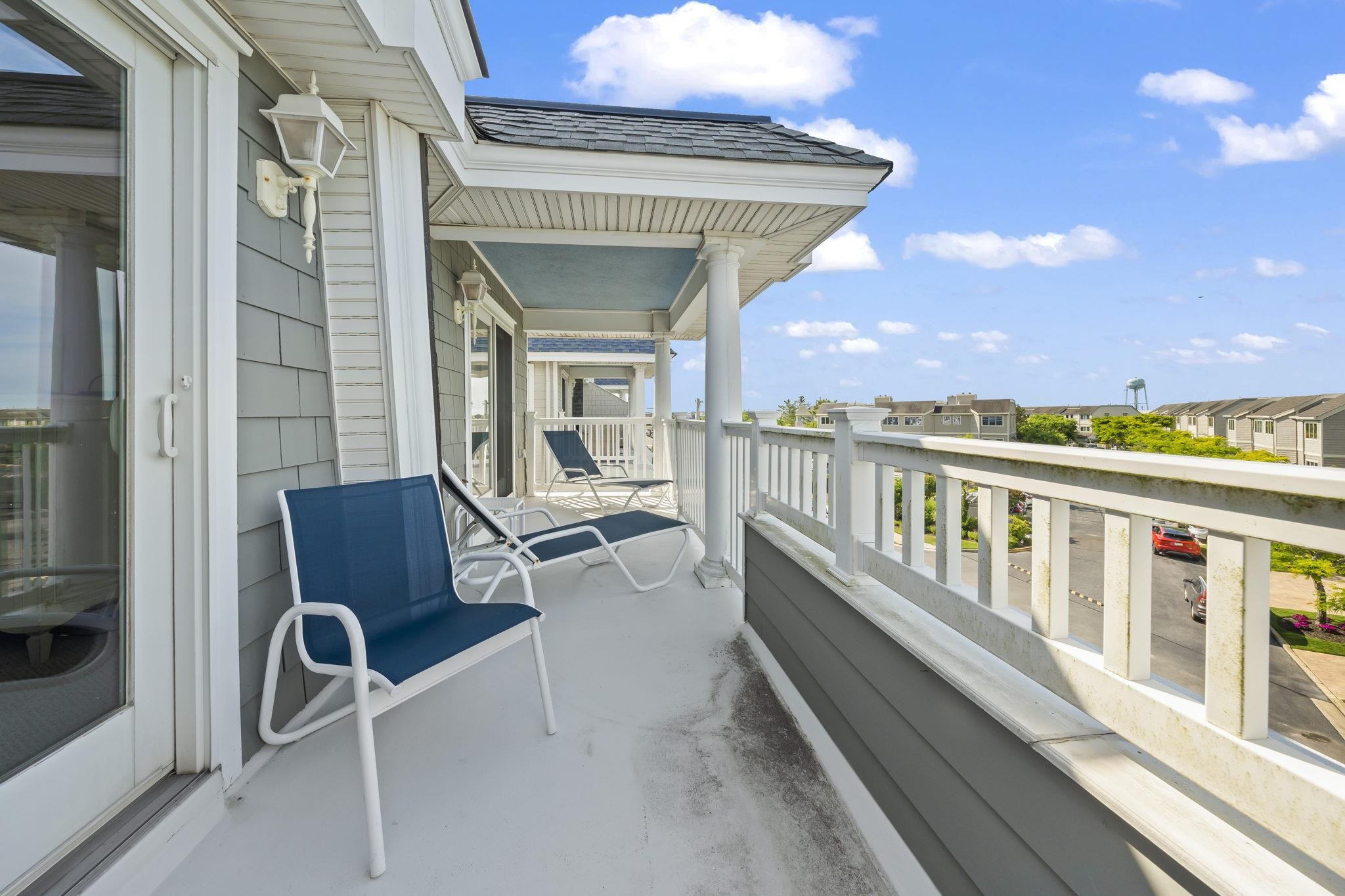 700 Ocean Drive, Unit E4 Avalon, NJ 08202 - Photo 25 of 31 a view of a balcony with chairs