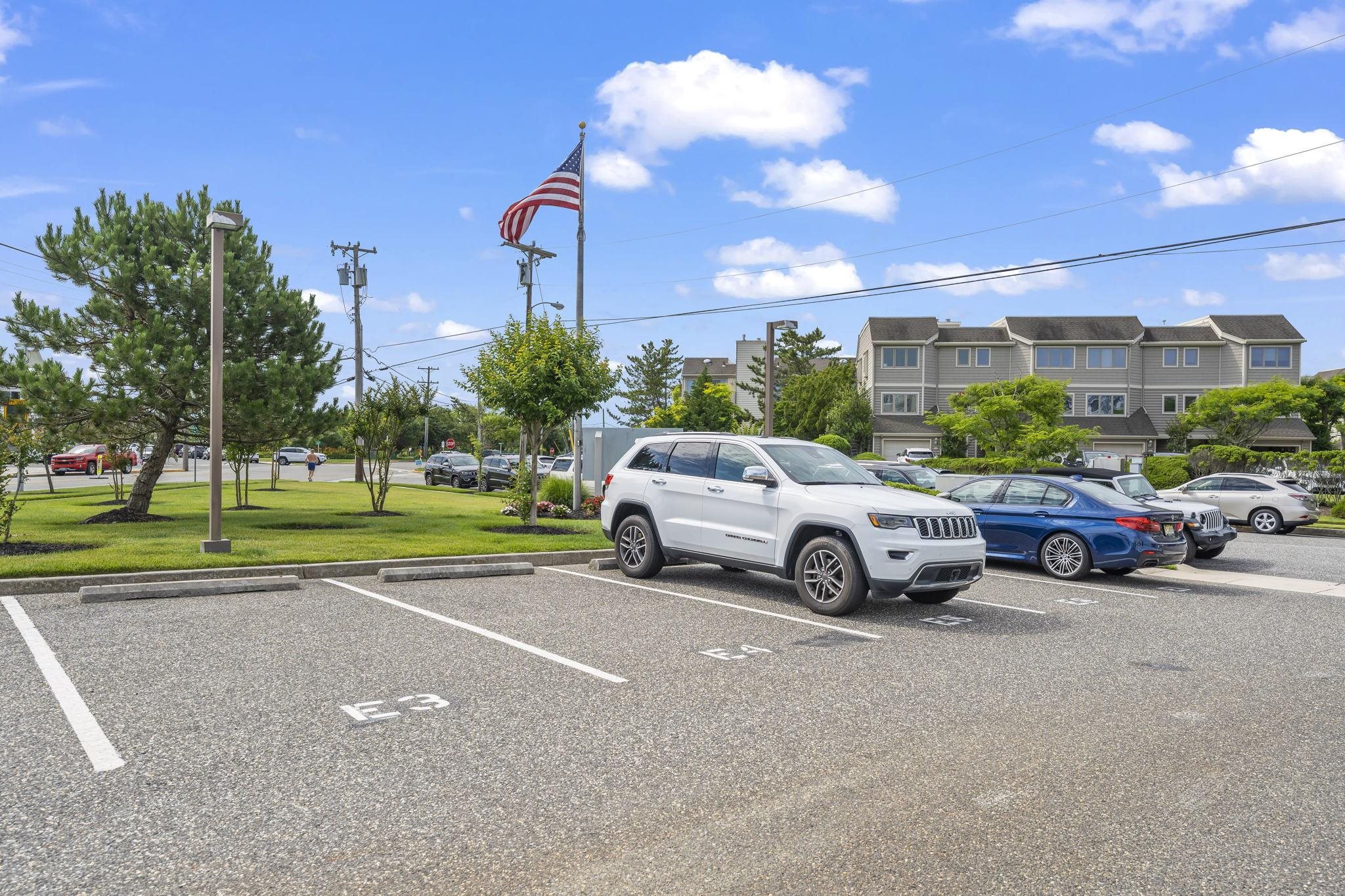 700 Ocean Drive, Unit E4 Avalon, NJ 08202 - Photo 31 of 31 a view of a cars parked in a parking lot