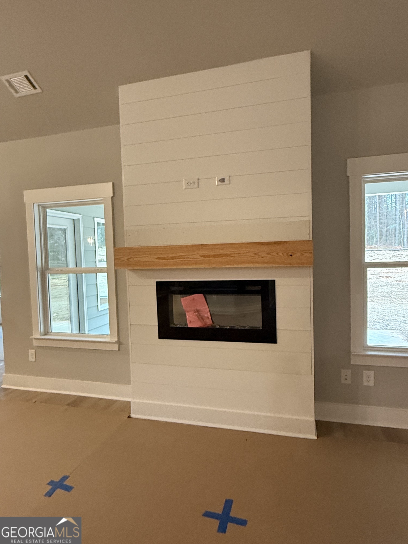 404 Tanners Bridge Road Bethlehem, GA 30620 - Photo 3 of 9 a view of an empty room with a window
