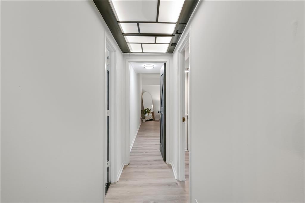 3648 Peachtree Road Northeast, Unit 1A Atlanta, GA 30319 - Photo 13 of 36 a view of a hallway