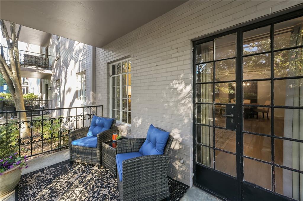 3648 Peachtree Road Northeast, Unit 1A Atlanta, GA 30319 - Photo 23 of 36 a living room with furniture