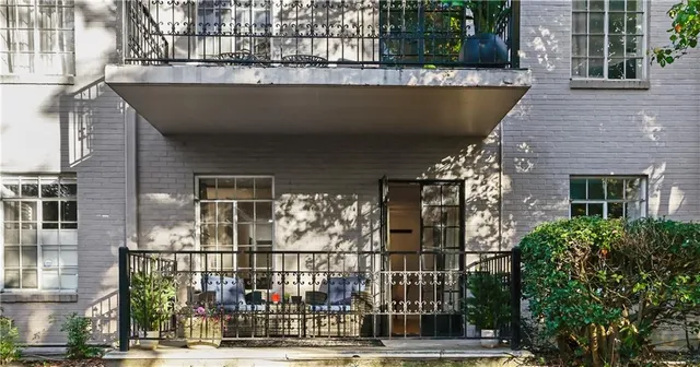 a view of a building from a balcony