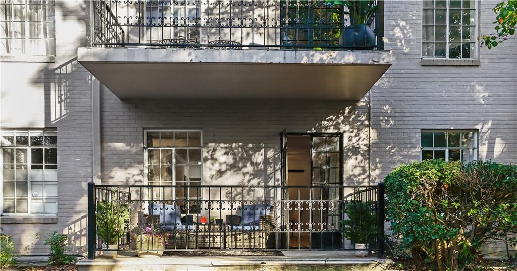 3648 Peachtree Road Northeast, Unit 1A Atlanta, GA 30319 - Photo 24 of 36 a view of a building from a balcony