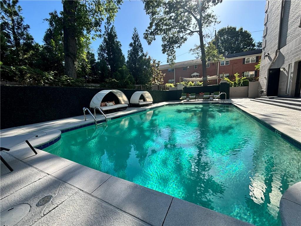 3648 Peachtree Road Northeast, Unit 1A Atlanta, GA 30319 - Photo 28 of 36 a view of a garden with sitting area