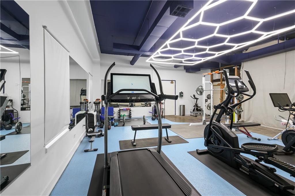 3648 Peachtree Road Northeast, Unit 1A Atlanta, GA 30319 - Photo 31 of 36 a view of a room with gym equipment