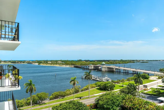 an aerial view of a house with a lake view