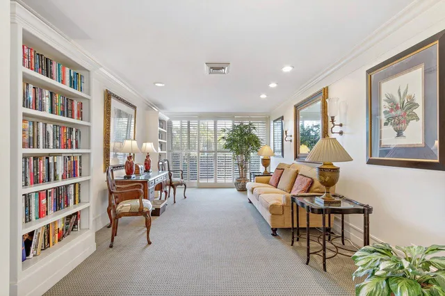 a view of a roof deck with patio