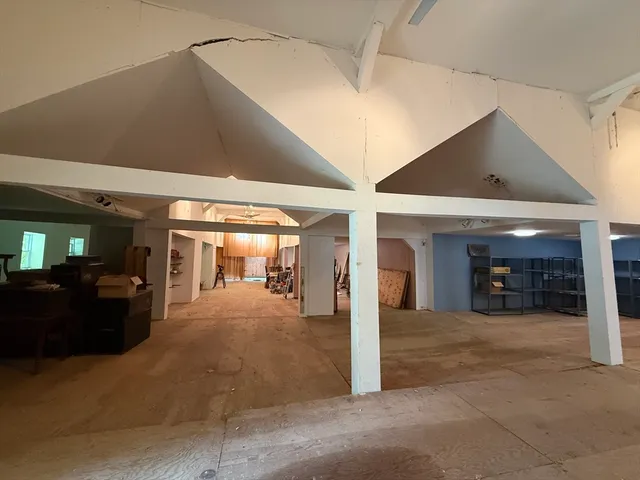 a view of a hall with the front door