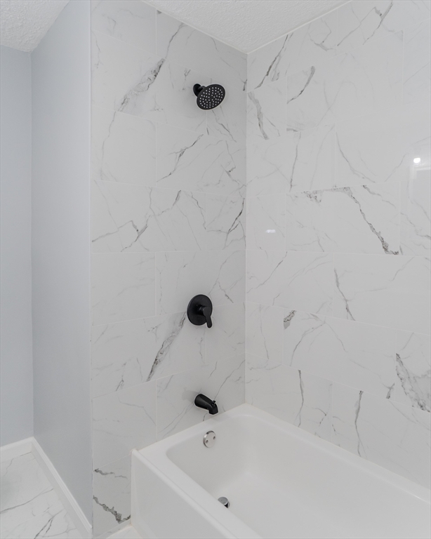 100 Pine Street Ludlow, MA 01056 - Photo 18 of 29 a bathroom with a tub