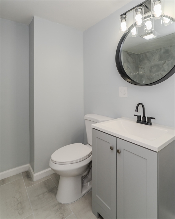 100 Pine Street Ludlow, MA 01056 - Photo 23 of 29 a bathroom with a sink and a mirror
