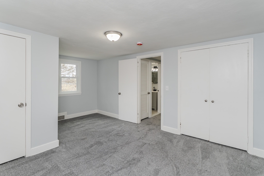 100 Pine Street Ludlow, MA 01056 - Photo 26 of 29 an empty room with windows and closet