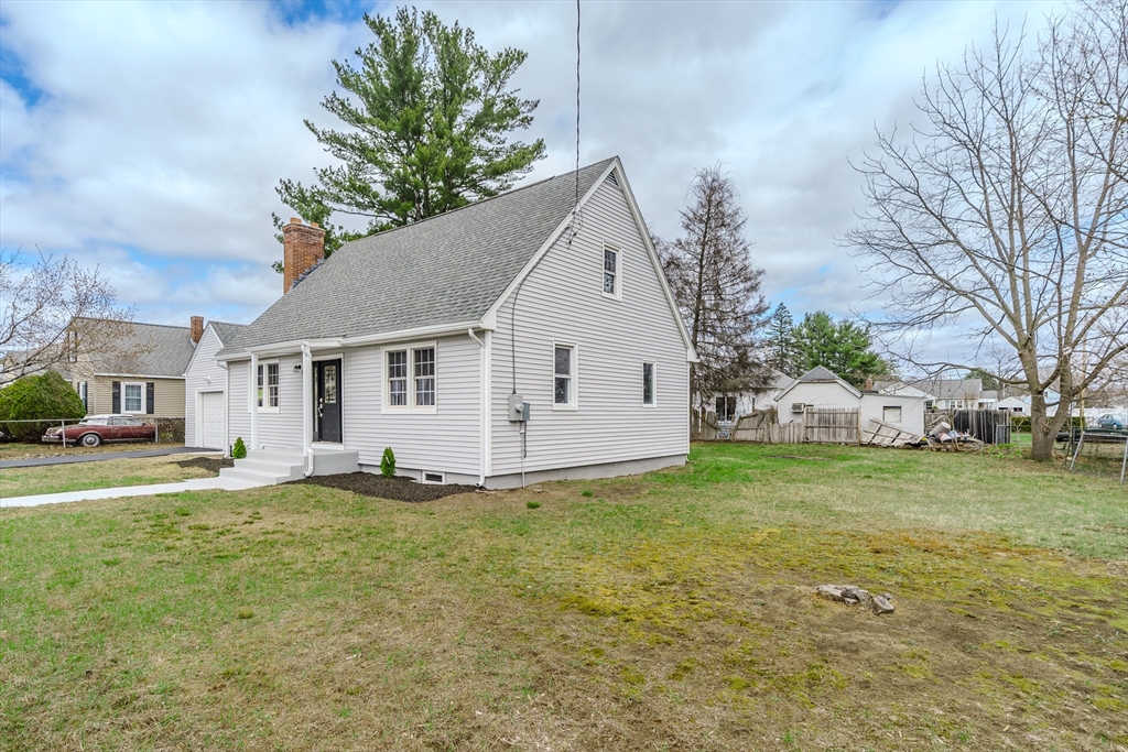 100 Pine Street Ludlow, MA 01056 - Photo 3 of 29 a view of a house with a yard