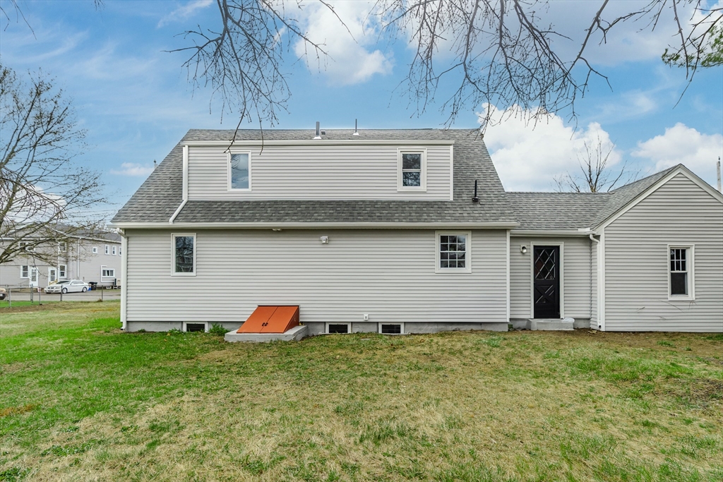 100 Pine Street Ludlow, MA 01056 - Photo 5 of 29 a front view of house with yard