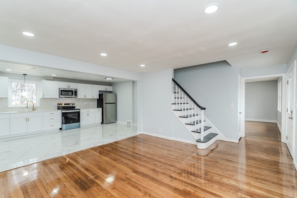 100 Pine Street Ludlow, MA 01056 - Photo 8 of 29 a view of kitchen with furniture and wooden floor