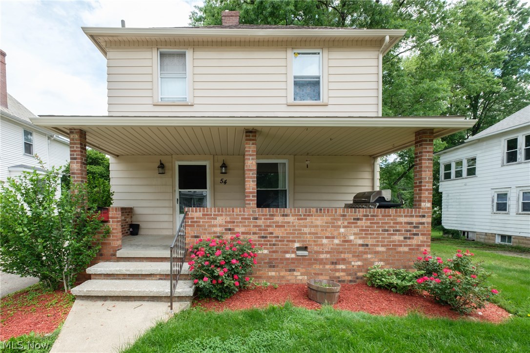 54 South 3rd Street Rittman, OH 44270 - Photo 21 of 29 A large open brick porch adds additional living space that can be used in rainy or sunny weather!
