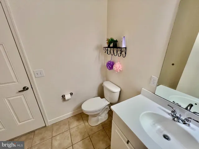 a view of workspace with furniture and wooden floor