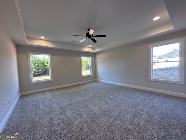 3647 Youngs Mill Road Hogansville, GA 30230 - Photo 13 of 34 an empty room with windows and chandelier fan
