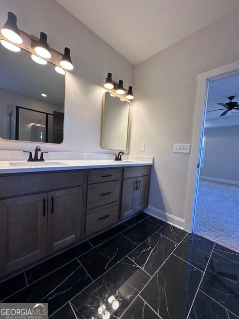 3647 Youngs Mill Road Hogansville, GA 30230 - Photo 16 of 34 a bathroom with a double vanity sink a mirror and a shower