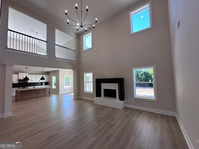 3647 Youngs Mill Road Hogansville, GA 30230 - Photo 21 of 34 a view of a kitchen with wooden floor and a fireplace