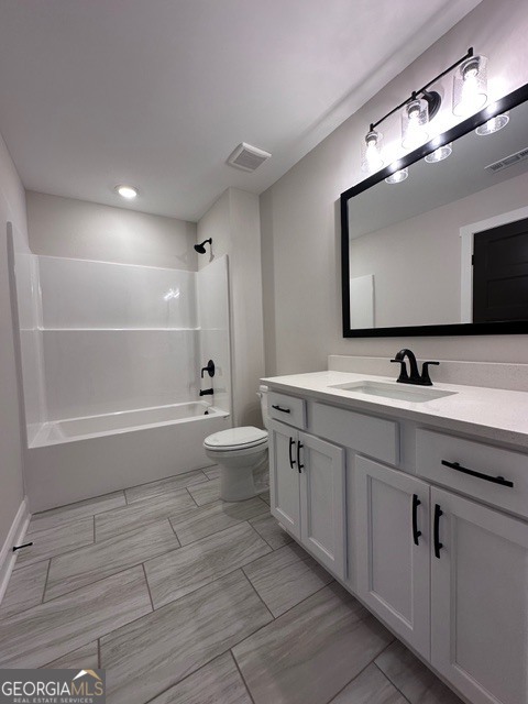 3647 Youngs Mill Road Hogansville, GA 30230 - Photo 24 of 34 a bathroom with a double vanity sink a toilet a mirror and shower