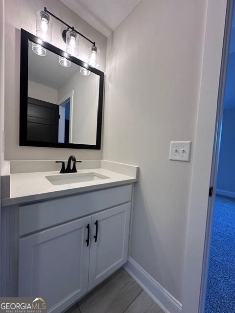 3647 Youngs Mill Road Hogansville, GA 30230 - Photo 28 of 34 a bathroom with a sink vanity and mirror