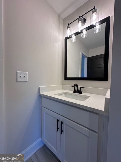 3647 Youngs Mill Road Hogansville, GA 30230 - Photo 29 of 34 a bathroom with a sink and a mirror