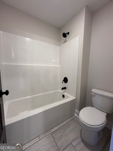 3647 Youngs Mill Road Hogansville, GA 30230 - Photo 30 of 34 a bathroom with a sink a toilet and a bathtub